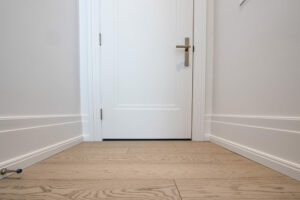 baseboard leading to bedroom door