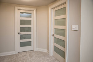 French shaker doors with Diffused white laminate inserts